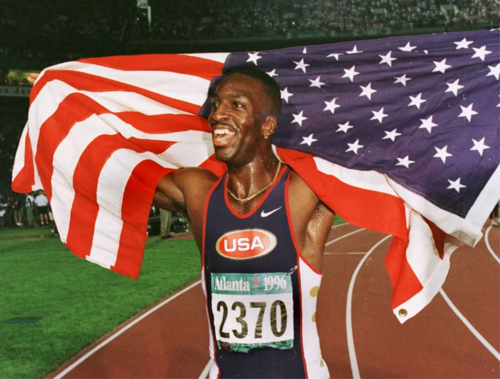 Justin Gatlin: Why Athletes Should Reveal Retirement Plans Early 6 Michael Johnson celebrates after track record 200m Olympics 1996