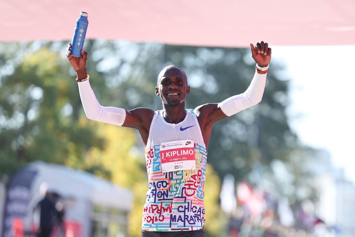 Jacob Kiplimo of Uganda celebrates his 2025 Bank of America Chicago Marathon win with a time of 02:02:23 on October 12, 2025 in Chicago, Illinois. (Photo by Geoff Stellfox/Getty Images)