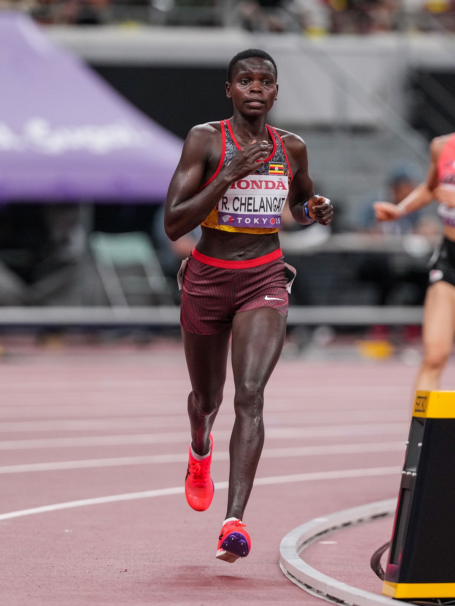 TOKYO, JAPAN - SEPTEMBER 13: Sarah Chelangat of Uganda competing during the Women 10,000 Metres Final on day one of the World Athletics Championships Tokyo 2025 at National Stadium on September 13, 2025 in Tokyo, Japan. (Photo by Joris Verwijst/BSR Agency/Getty Images)